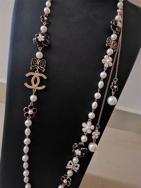 chanel long pearl necklaces.